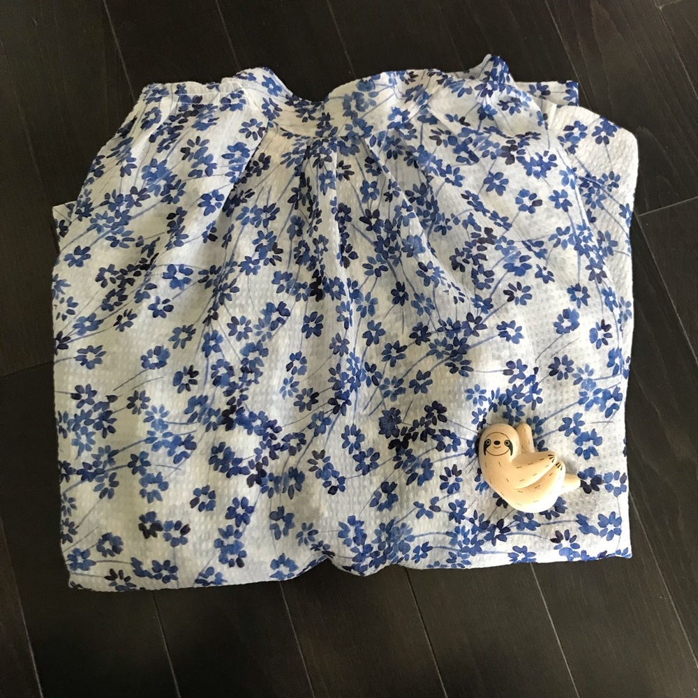 Blue and white floral blouse